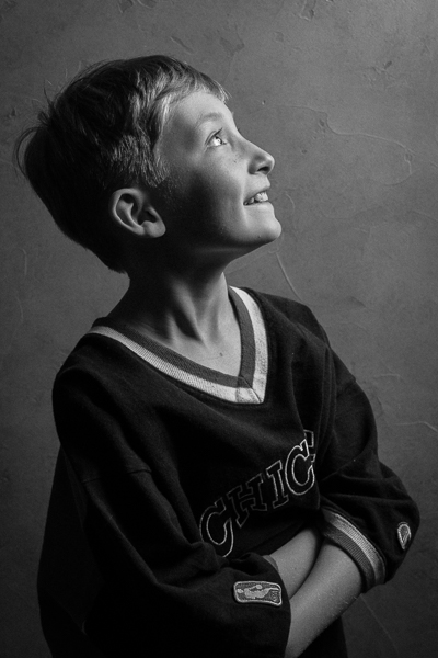 Drew posing for portrait in front of the Wescott softbox